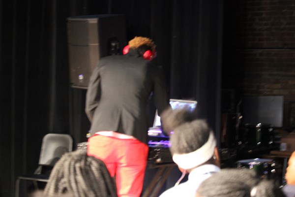 DJ Ovaflow performs for students